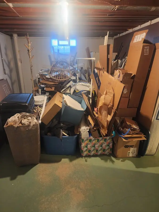 Roll-off dumpster container at job site for 2 Yard Dumpster Rental in Forrest City